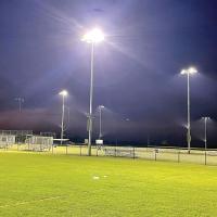 Newly installed LED lights shine down on the football and baseball fields at the Ashbrook Complex