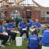 Volunteers like this group from Southwest Airlines converged on El Reno