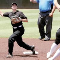 Iliana Ashford tags second base with her back foot as she sets up to make a throw toward first on a double play