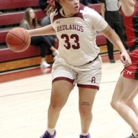 Isabella Stafford dribbles