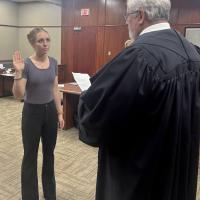 Judge Bob Hughey swears in new CASA volunteer Jennie Shain