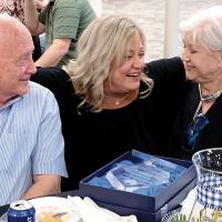 Kristin Garner Smith visits with Freddie and Jeanne Hobson
