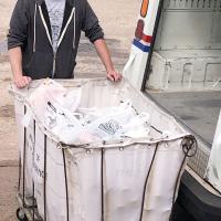 Jesse Wright gets set to push a cart full of food items