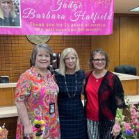 Judge Hatﬁeld with bailiffs Bonnie Payne and Tammy Perando