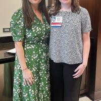 Kate Menz (right) poses for a photo with Minority Leader Cyndi Munson