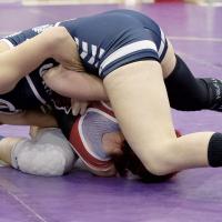 Kaylee Davis works to roll an opponent