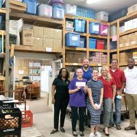 LGI representatives present funds to Nikki Pruitt