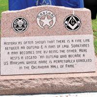 A memorial marker to U.S. Deputy Marshal Chris Madsen