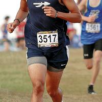Matthew Tofpi runs a straightaway