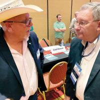 Craig McVay, left, visits with John D. Montgomery