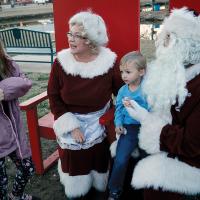 Meloni Norton tells Santa and Mrs. Claus what she wants for Christmas