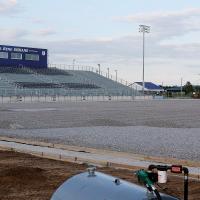The rock base of the new turf playing surface at Memorial Stadium