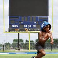 Brad Palmer makes a cut on the Memorial Stadium turf