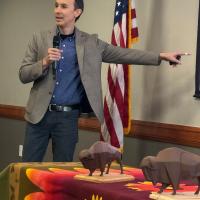 Nathan Pratt points to an element for the proposed bison statue for Adams Park