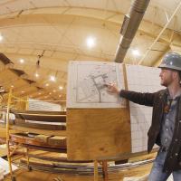 Nathan Smith points out details of the main show arena on construction plans