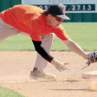 Kingston Arnold reaches out to tag a Bethany base runner