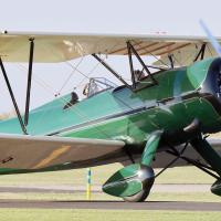Steve Jensen jumped into the front seat of this green 1941 Waco ZPF7 for a flight around the city