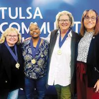 Jena Marr (right) congratulates RCC honorees (from left), Marcia Shottenkirk, Stephanie Fisher and Debbie Newberry