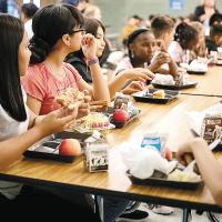 Fifth-graders at Roosevelt Middle School ate chicken sandwiches and fried chicken for lunch