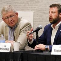 Frank Lucas, left, listens to Markwayne Mullin speak
