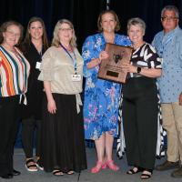 El Reno Tribune staff members accept the Sequoyah Award