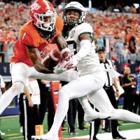 Tay Martin has a pass in the end zone broken up by a Baylor defender