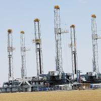 Several oil derricks sitting ready to be used outside Calumet