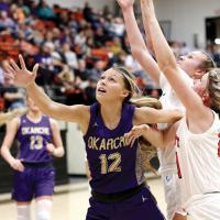 Ruby VanDenDriessche battles for a rebound