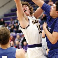P.K. Harris reacts as he is fouled on the arm