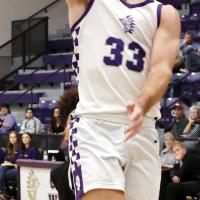 Easton Roby shoots a fastbreak layup