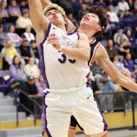 Colin Hendrickson shoots a fastbreak layup