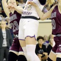 Emma Stover battles for a rebound