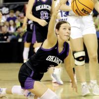 Harper White attempts to reach out and grab a loose ball