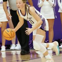 Katie Parham dribbles the ball up the court