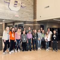 Okarche High School students and faculty pose for a picture with David Inge