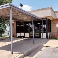 The former Department of Human Services building on North Rogers