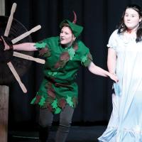 Peter Pan (Summer Camper) teaches Wendy (Taylor Bradshaw) how to fly