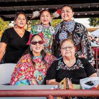 Dara Franklin (bottom right) is pictured with some of her family during the 2025 powwow