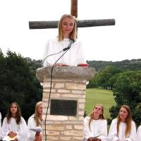 Grace Shoop speaking at the aide chapel service