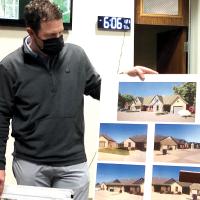 Mark Grubbs shows off the design of the senior housing development