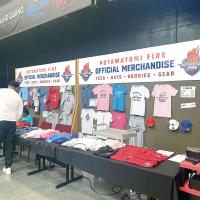 Fans examine the Potawatomi Fire merchandise