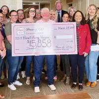 Power of 100 gives quarterly gift to RMH_story