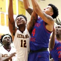 RCC mens basketball_Marshall battles for rebound