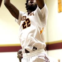 RCC men's basketball_Lamb powers up a shot