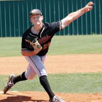 Nick Gagnon throws a split-fingered pitch toward the plat