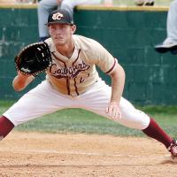 Nolan Gagnon stretches out to get in front of a throw to the base