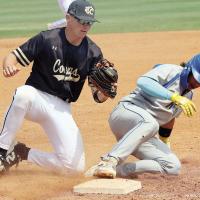 Brand Wilson follows through on a tag of a NEO base runner