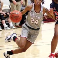 RCC women’s basketball_Hopkins drives ball past defender