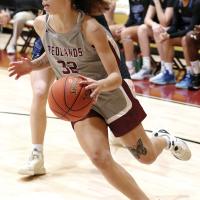 Ashlyn Evans-Thompson drives the baseline