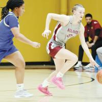 Katelyn Harviston dribbles the ball up the court